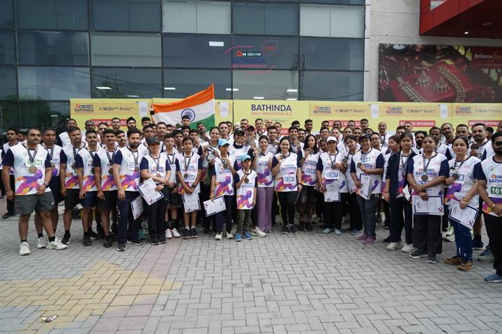 Runners gather at the Reliance Mall start area before Bathinda Half Marathon 8.0