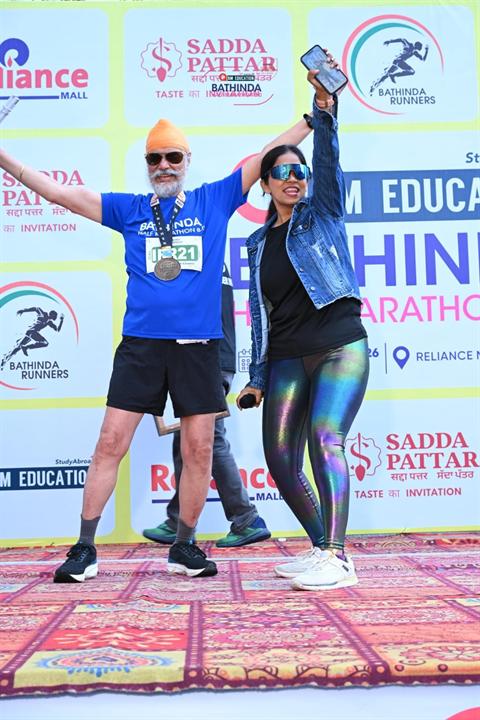 Two runners dance on stage at Bathinda Half Marathon 8.0
